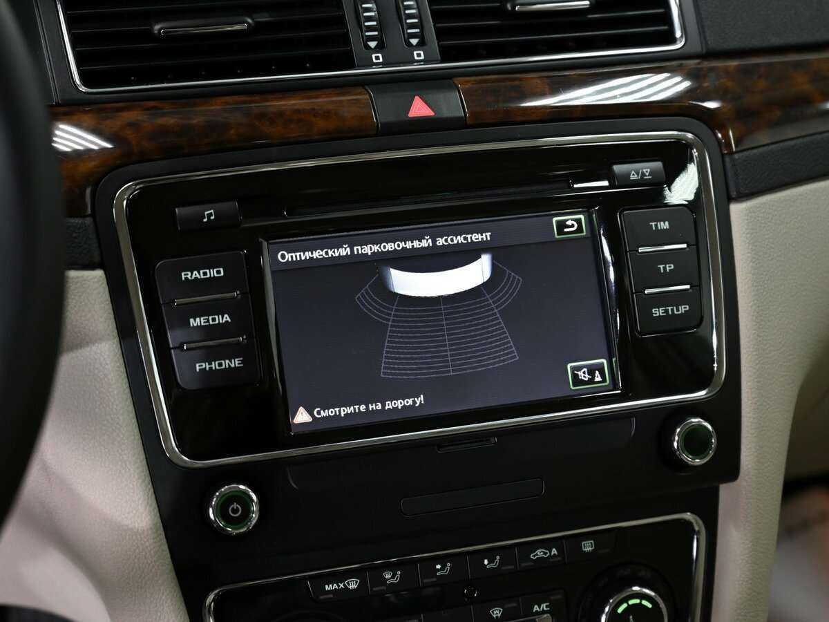 Skoda Superb с пробегом — 2013 год. Фото: #12