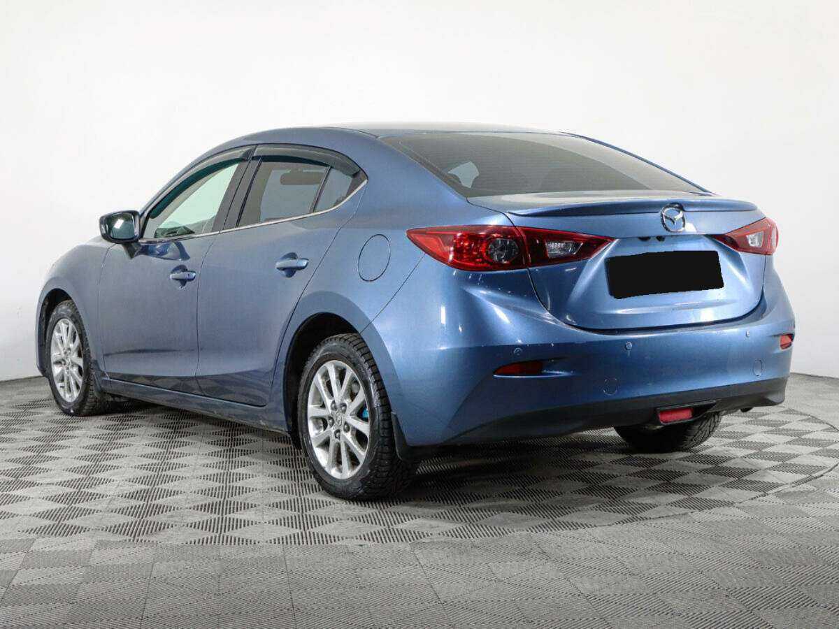 Mazda 3 с пробегом — 2013 год. Фото: #6
