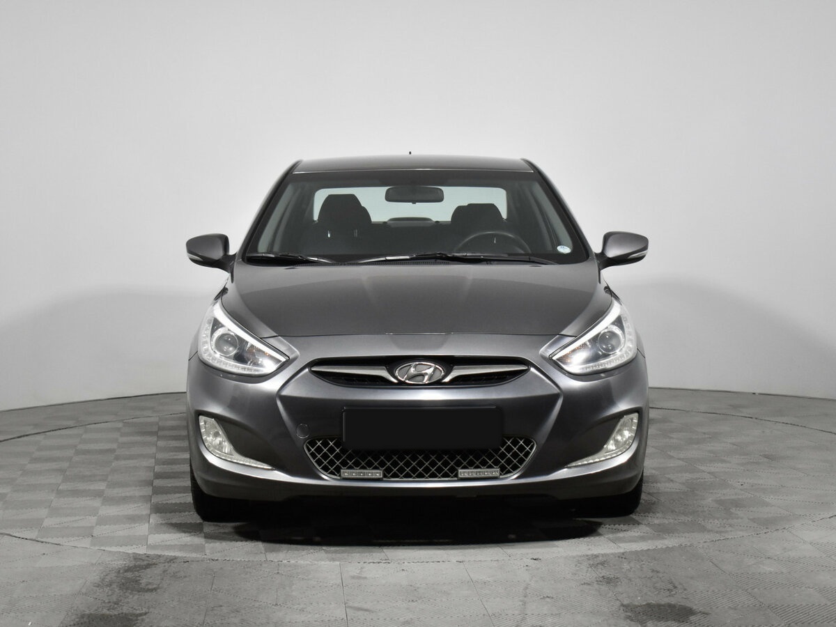 Hyundai Solaris с пробегом — 2013 год. Фото: #1