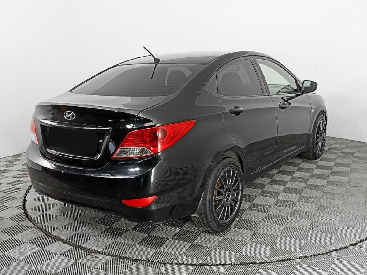 Hyundai Solaris с пробегом — 2013 год. Фото: #4