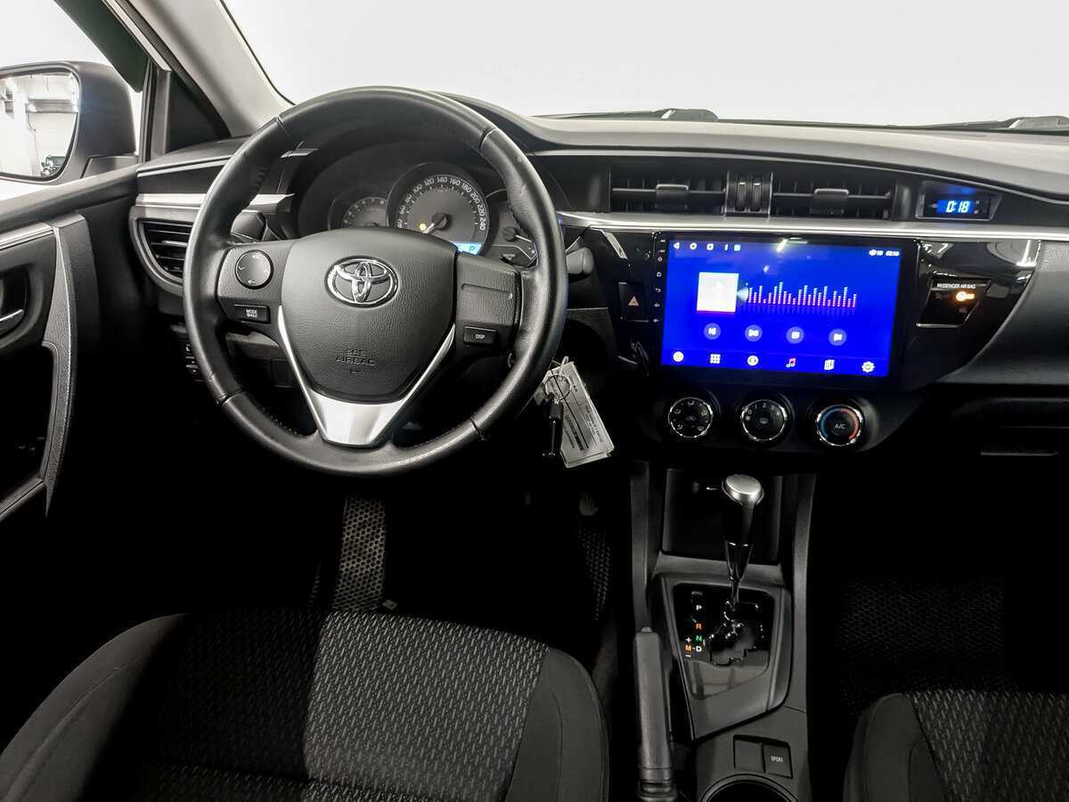 Toyota Corolla с пробегом — 2014 год. Фото: #24
