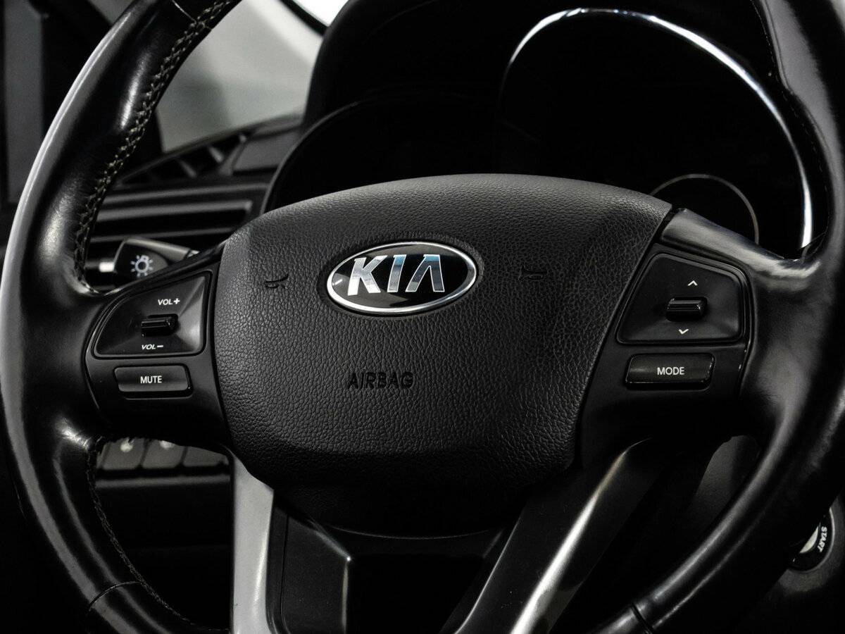 Kia Rio с пробегом — 2014 год. Фото: #11