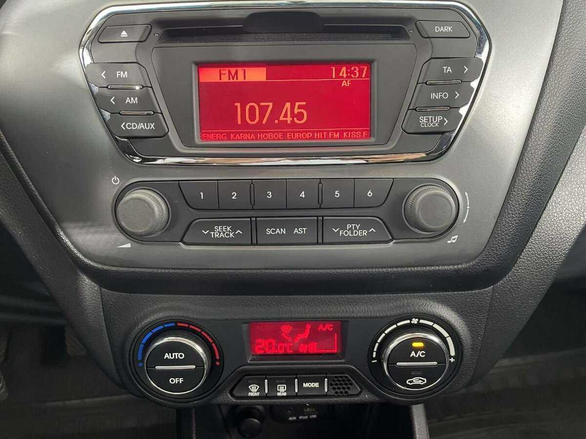 Kia Rio с пробегом — 2013 год. Фото: #11