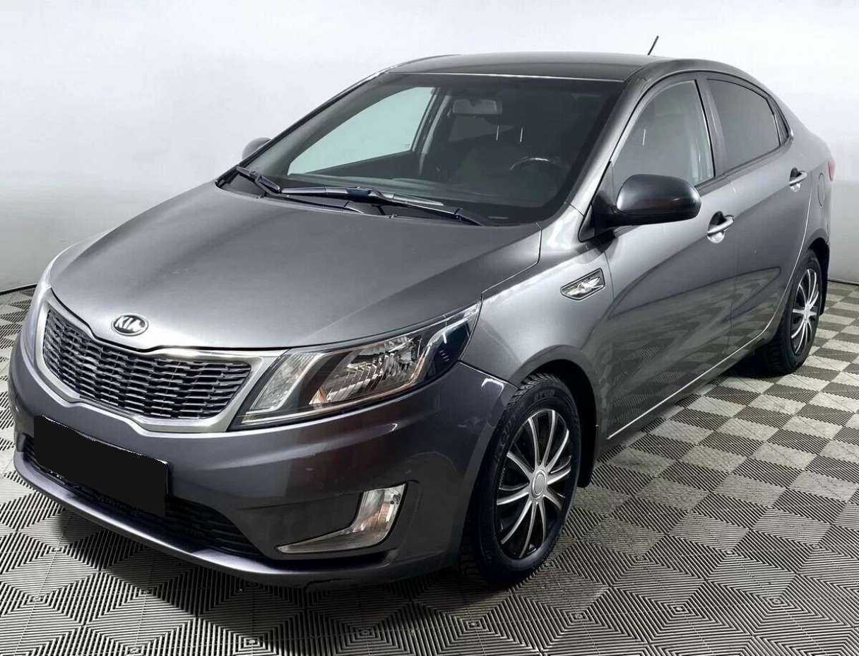 Kia Rio с пробегом — 2013 год. Фото: #0