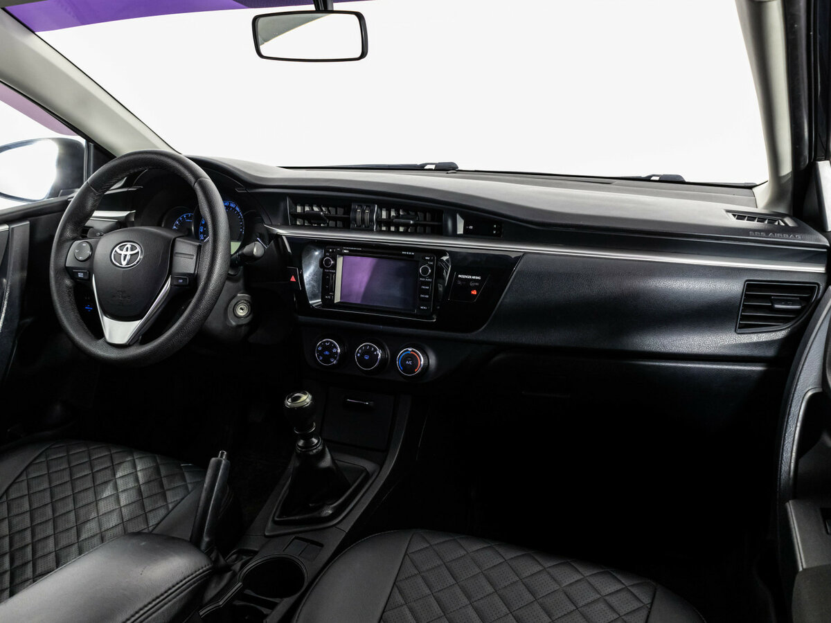 Toyota Corolla с пробегом — 2014 год. Фото: #6