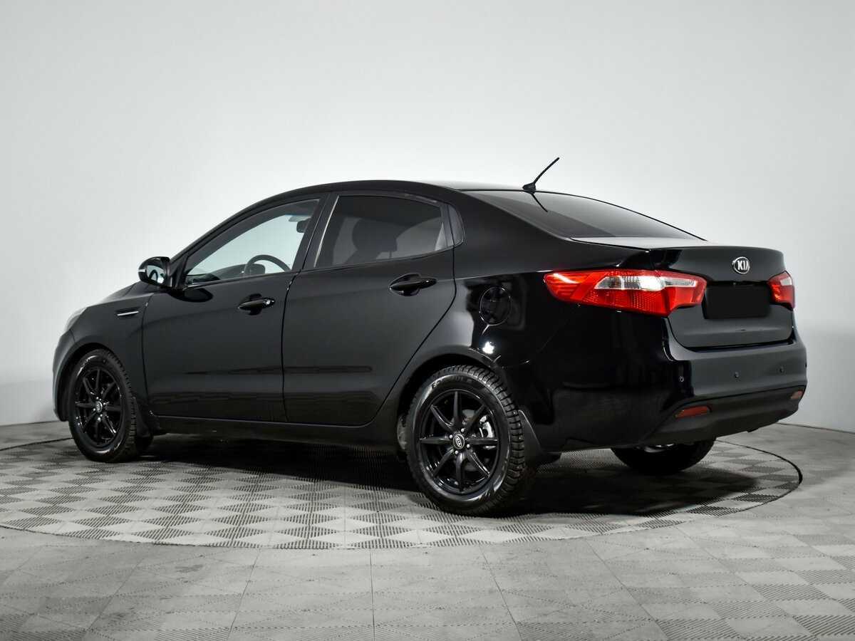Kia Rio с пробегом — 2013 год. Фото: #6