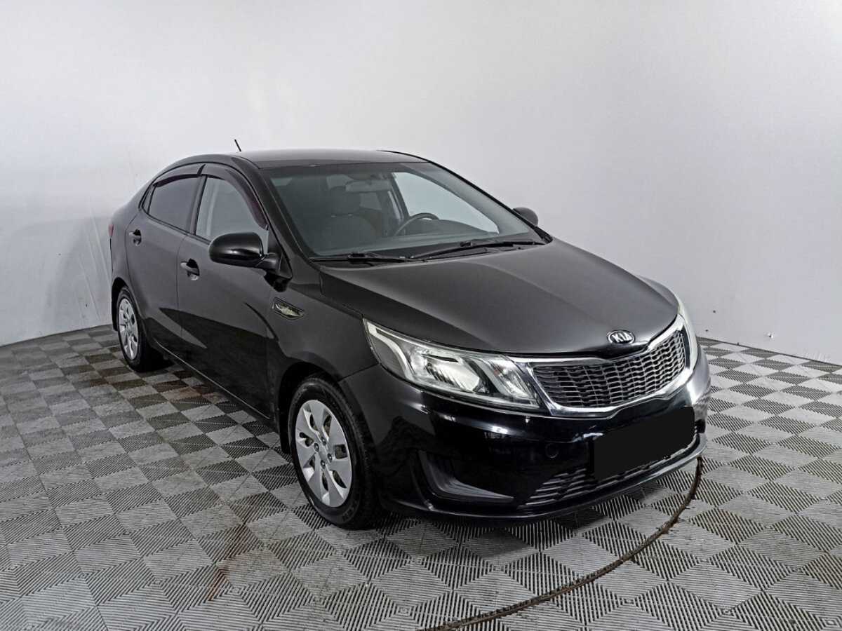 Kia Rio с пробегом — 2014 год. Фото: #2