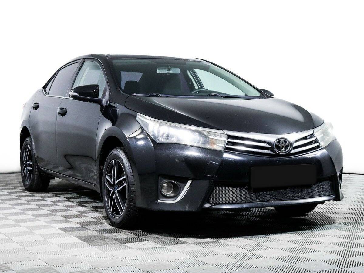 Toyota Corolla с пробегом — 2014 год. Фото: #2