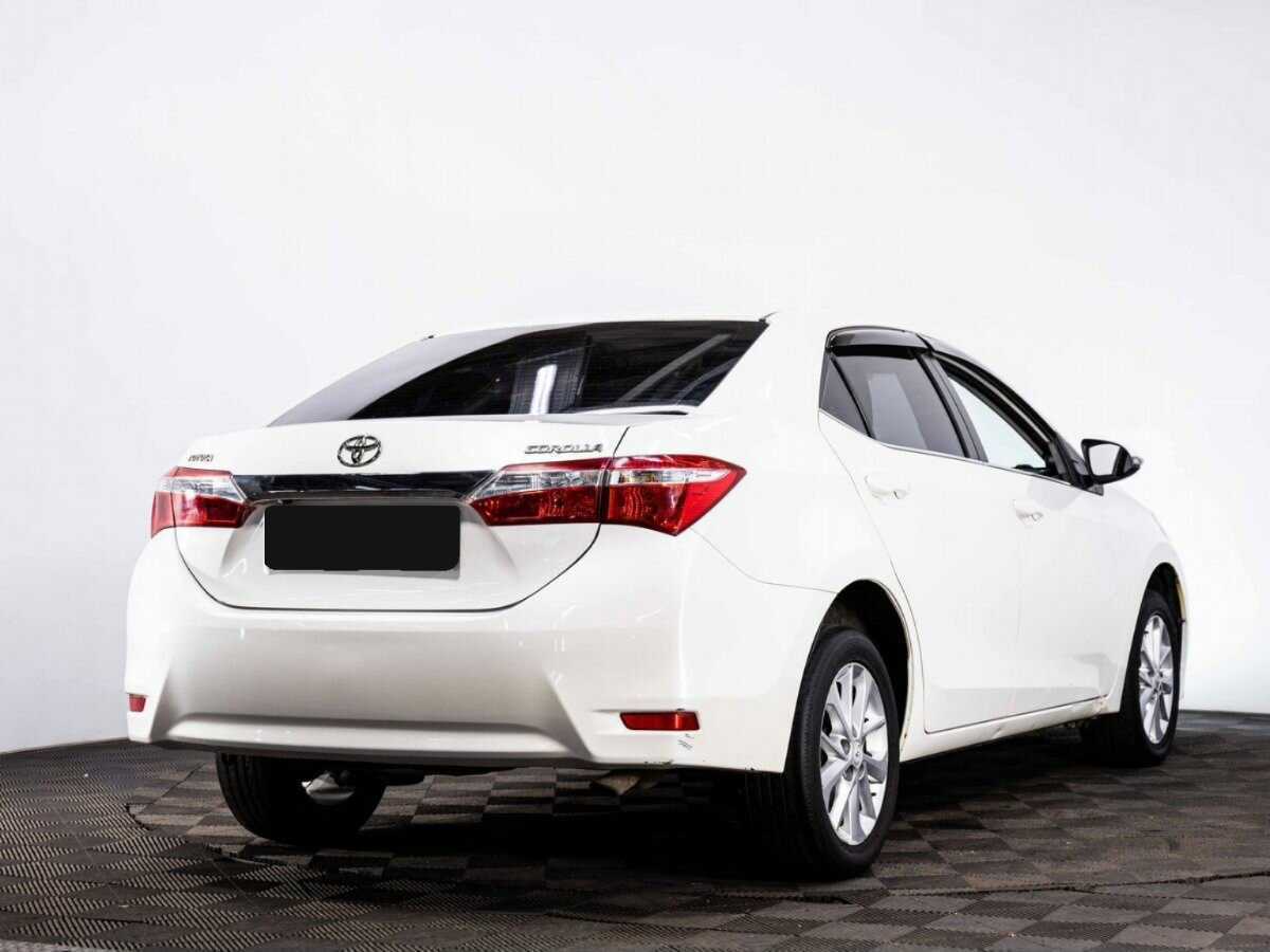 Toyota Corolla с пробегом — 2013 год. Фото: #5