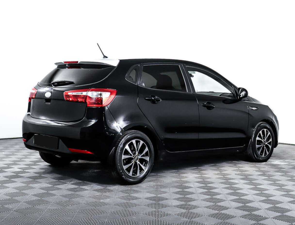 Kia Rio с пробегом — 2013 год. Фото: #4