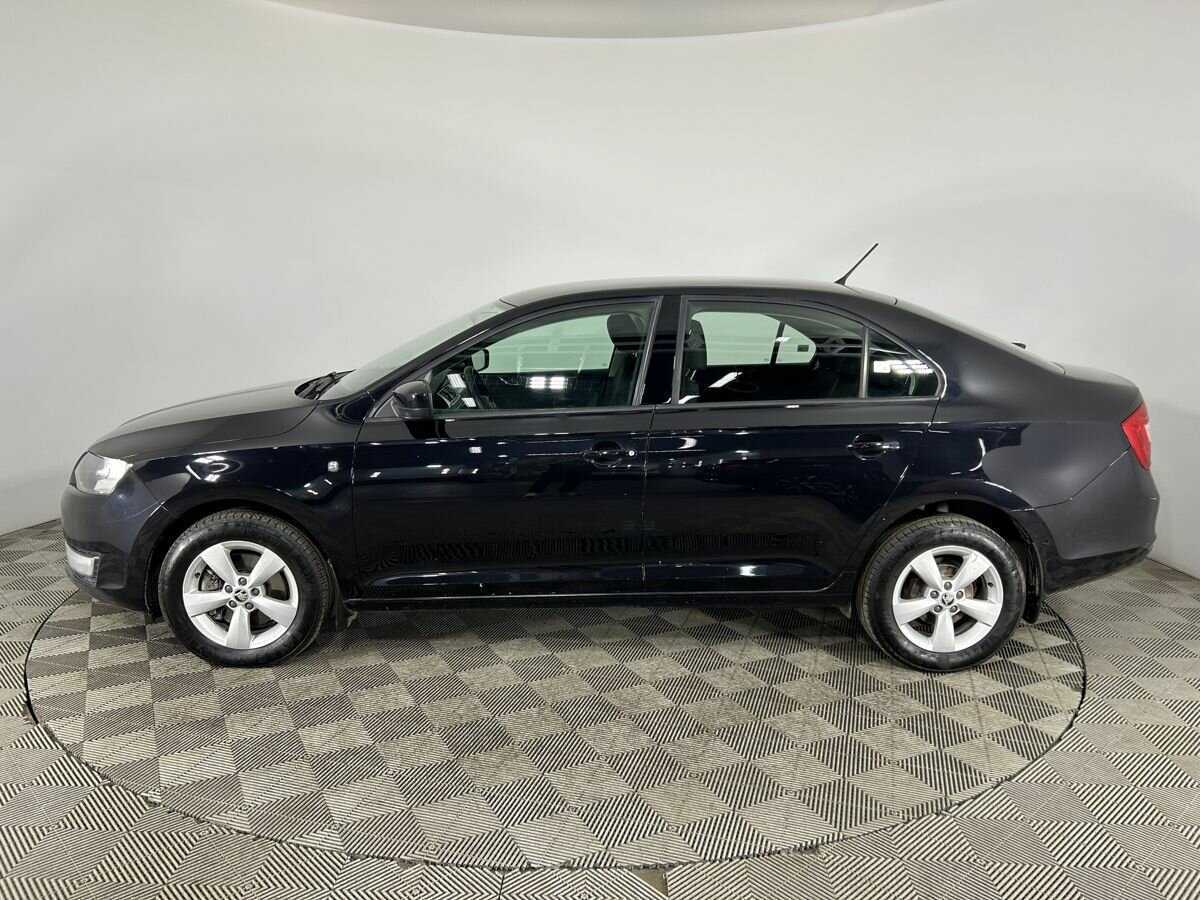 Skoda Rapid с пробегом — 2014 год. Фото: #4