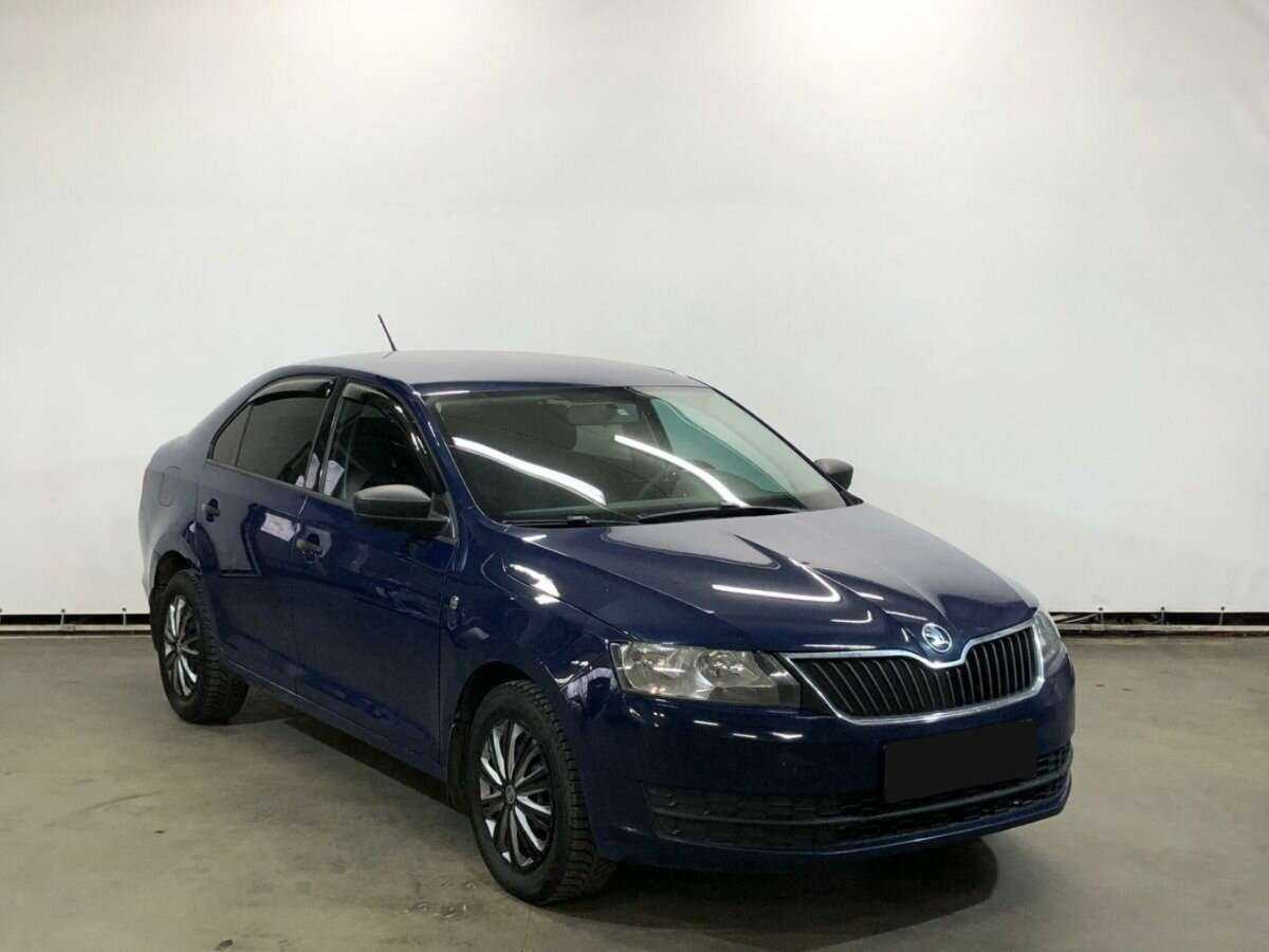 Skoda Rapid с пробегом — 2015 год. Фото: #2