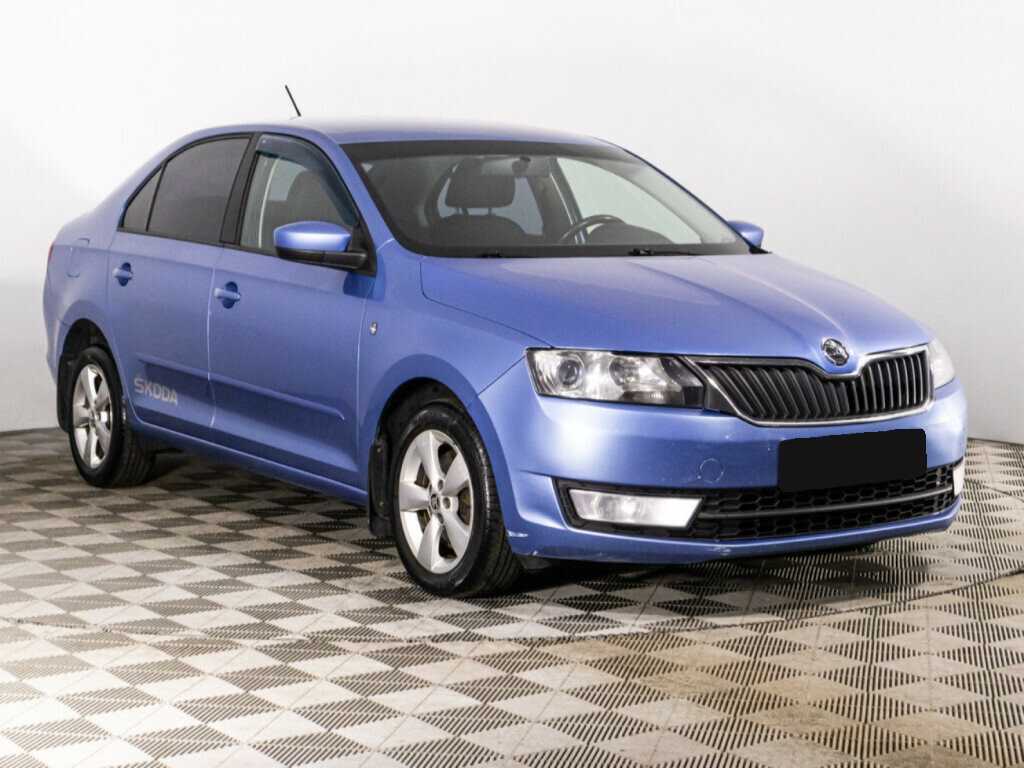 Skoda Rapid с пробегом — 2014 год. Фото: #2