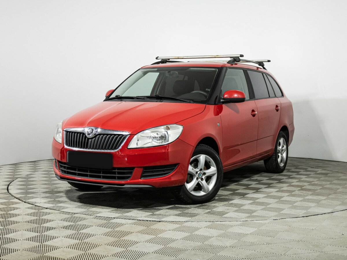 Skoda Fabia с пробегом — 2014 год. Посмотреть фото
