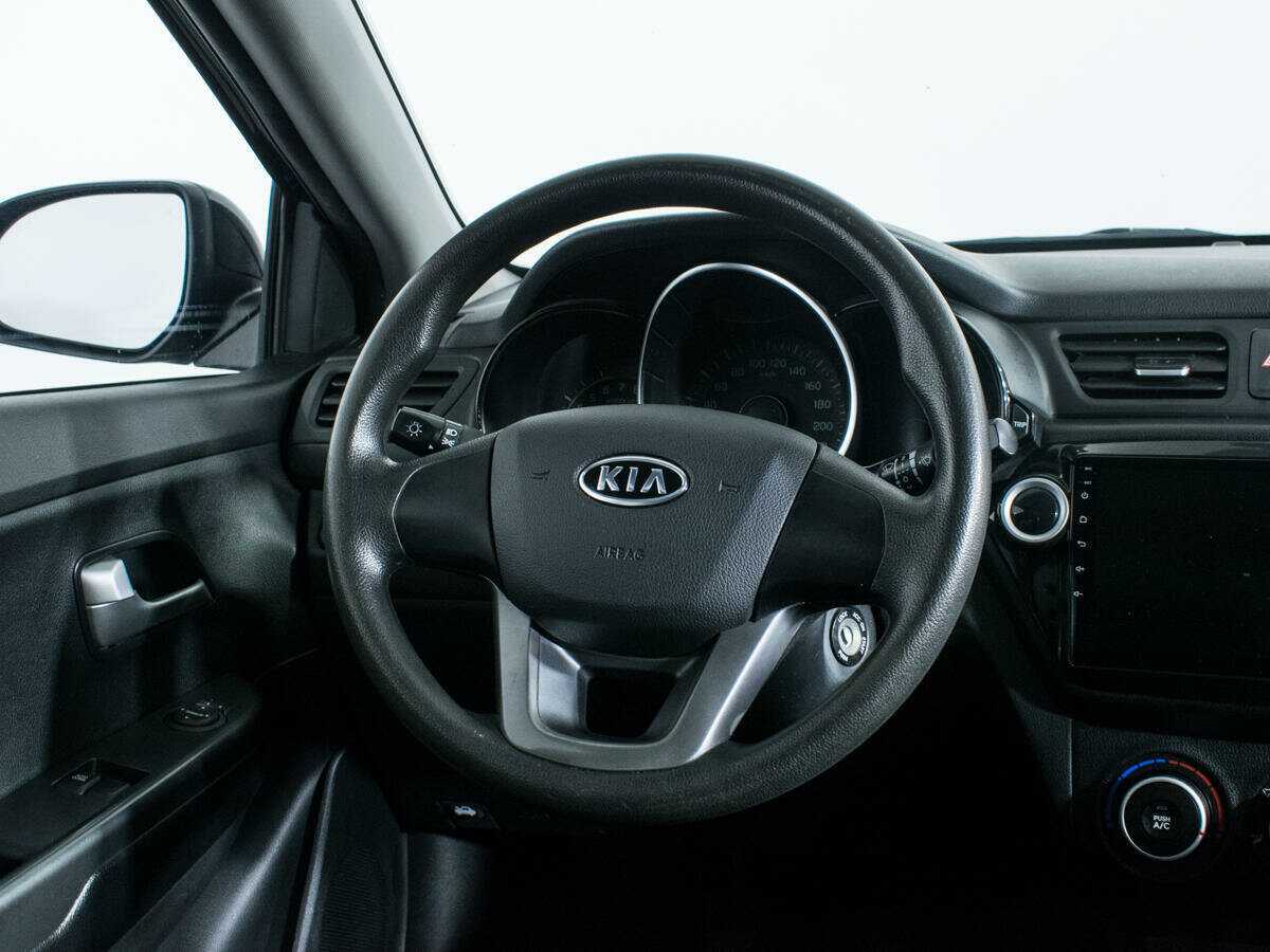 Kia Rio с пробегом — 2012 год. Фото: #13