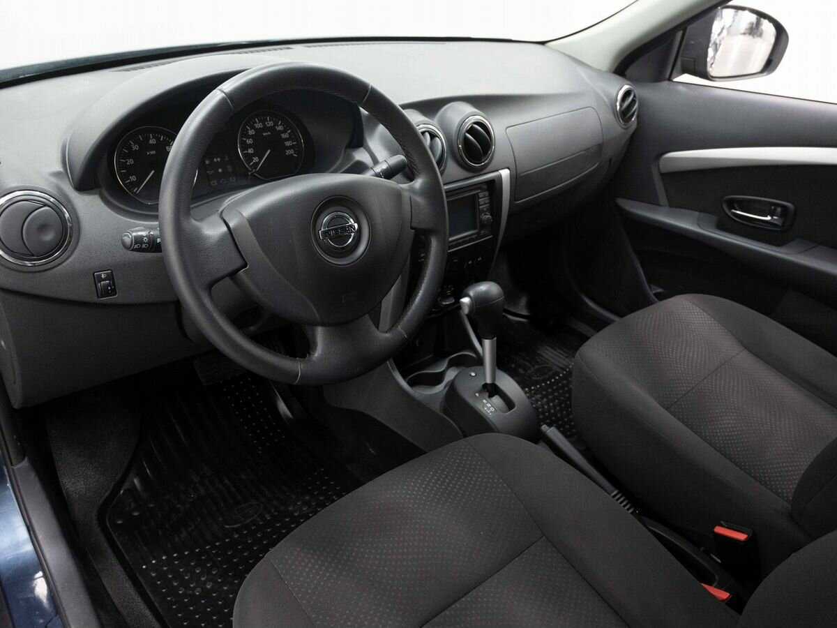 Nissan Almera с пробегом — 2013 год. Фото: #8