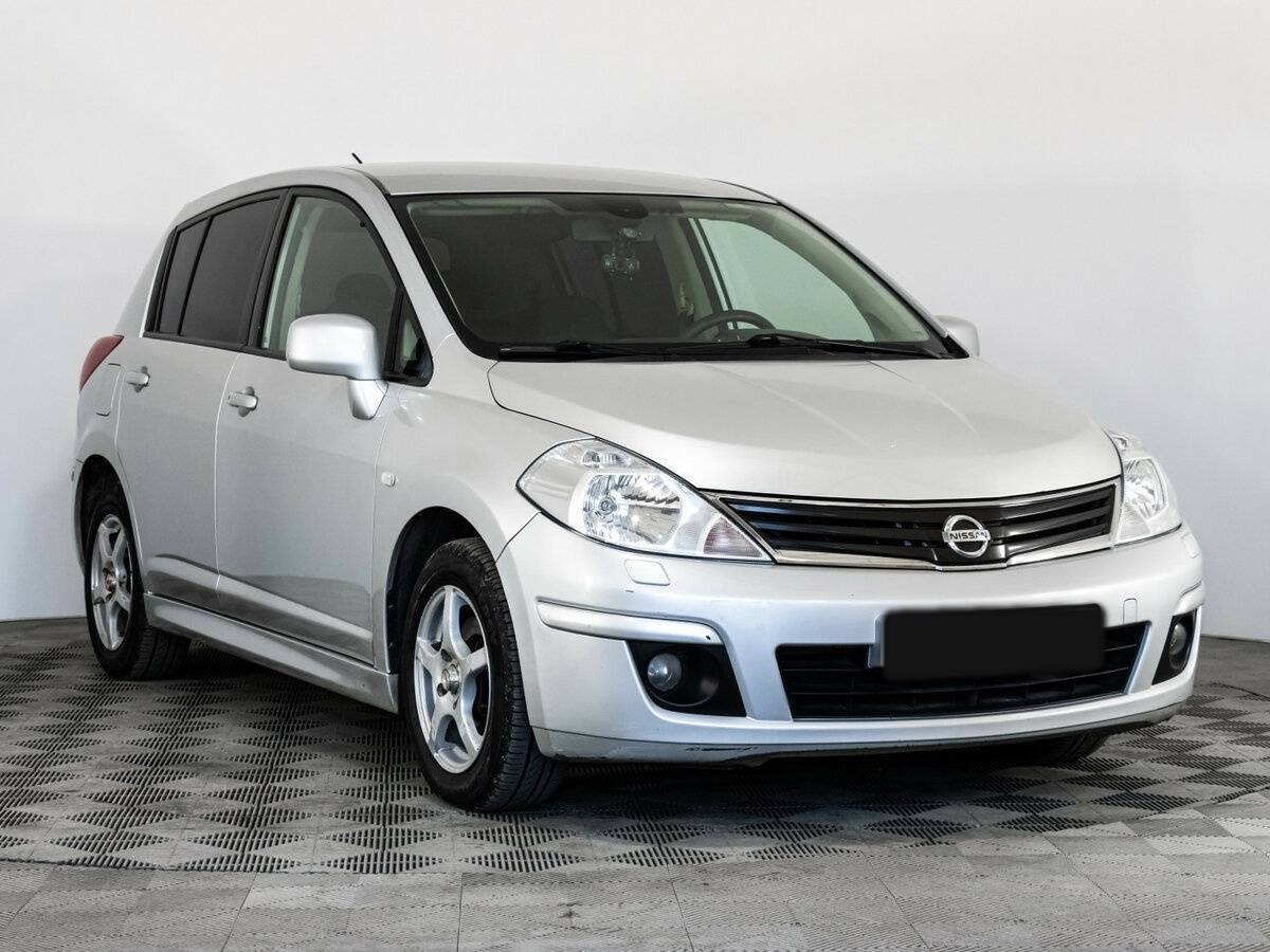 Nissan Tiida с пробегом — 2013 год. Фото: #2