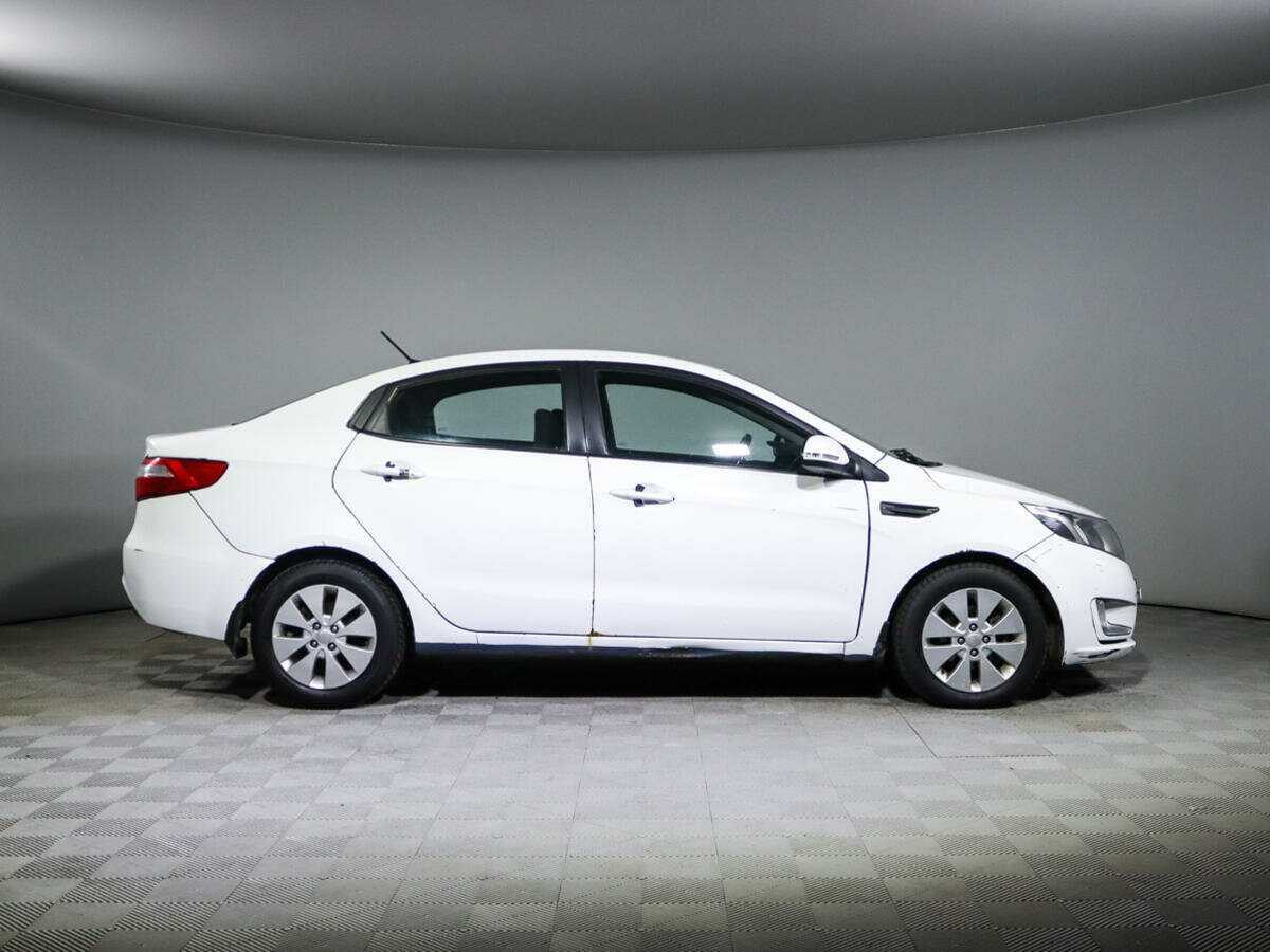 Kia Rio с пробегом — 2014 год. Фото: #3