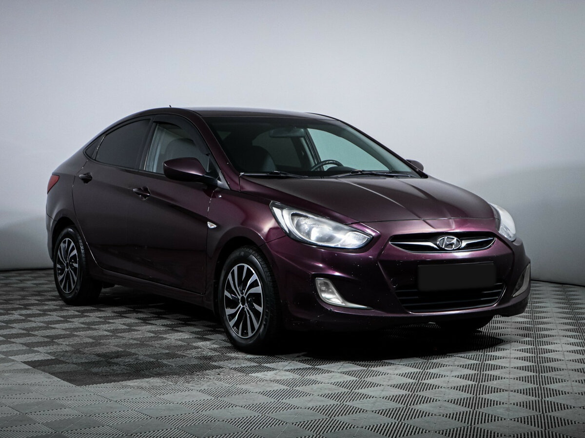Hyundai Solaris с пробегом — 2013 год. Фото: #2