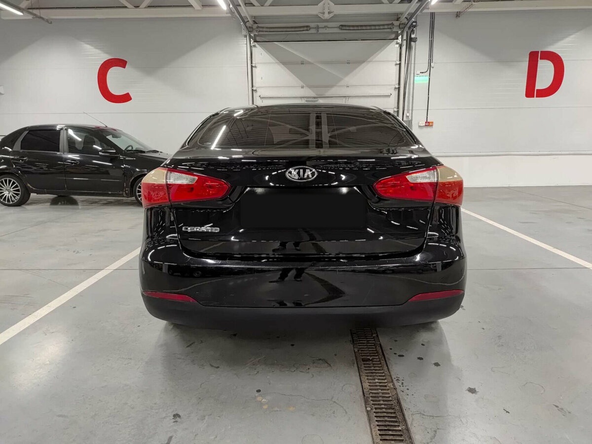 Kia Cerato с пробегом — 2013 год. Фото: #5