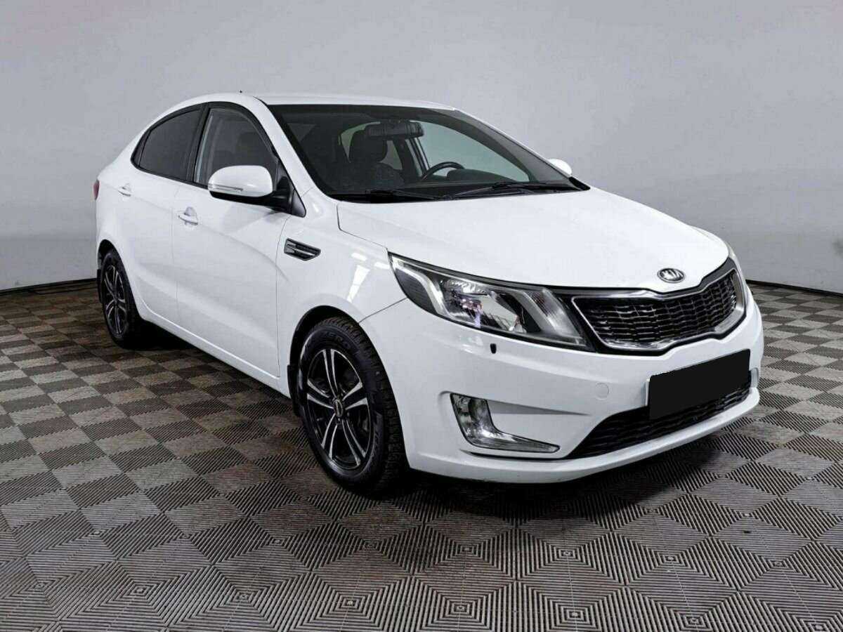 Kia Rio с пробегом — 2014 год. Фото: #2