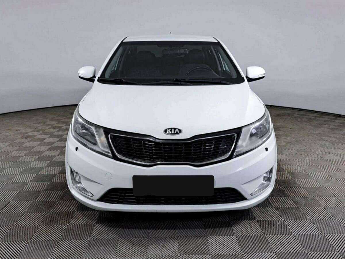 Kia Rio с пробегом — 2014 год. Фото: #1