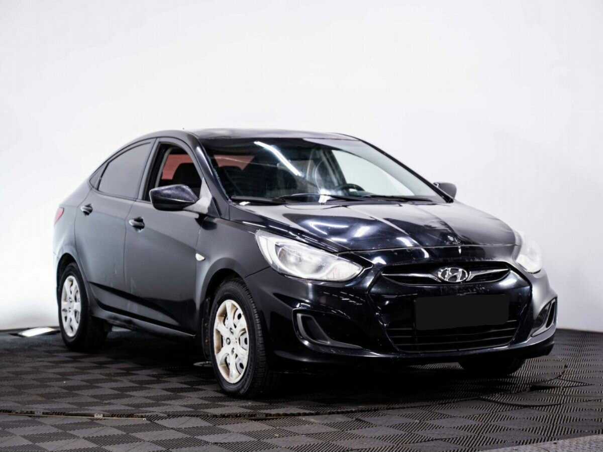 Hyundai Solaris с пробегом — 2013 год. Фото: #2
