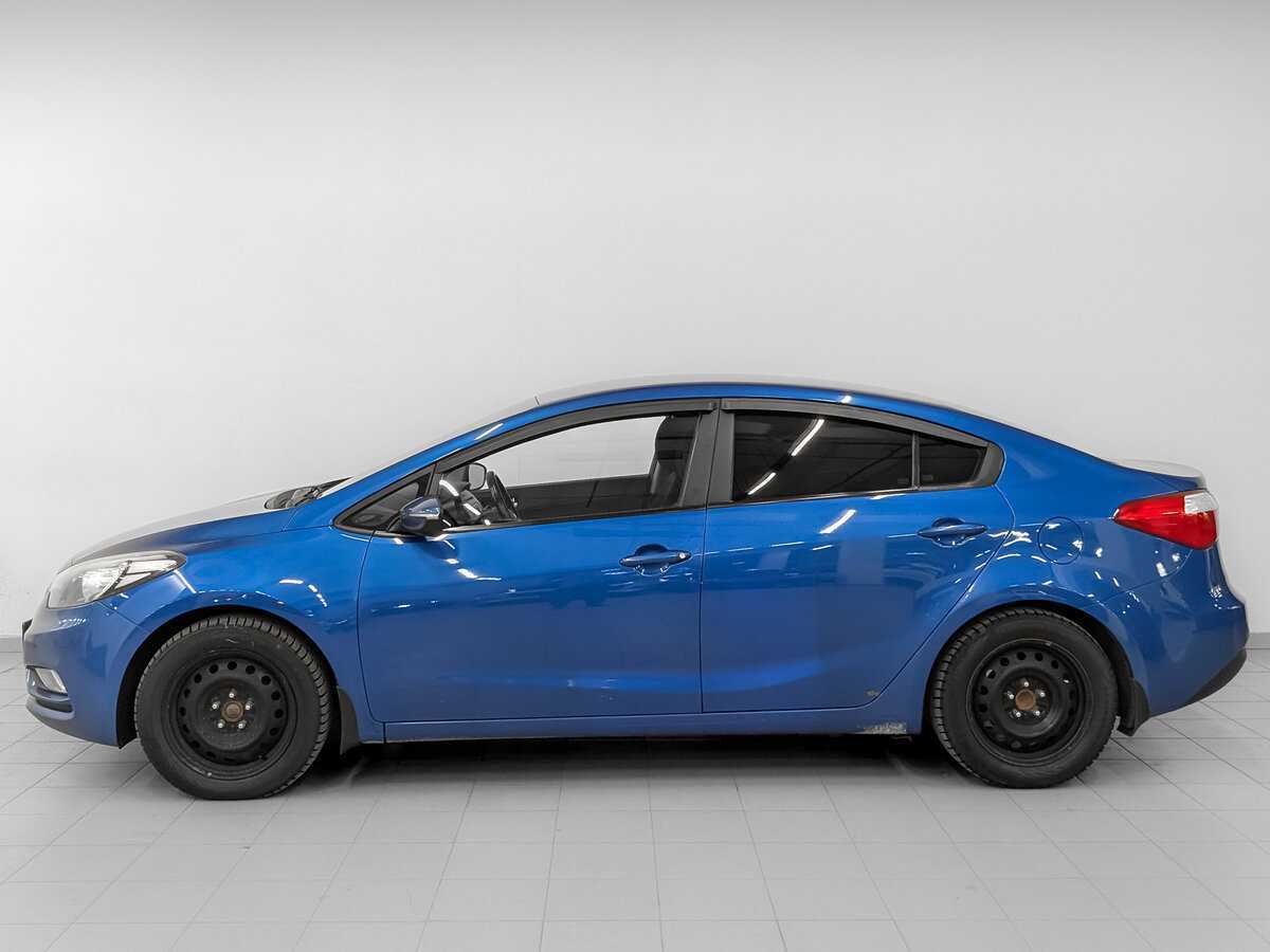 Kia Cerato с пробегом — 2013 год. Фото: #7