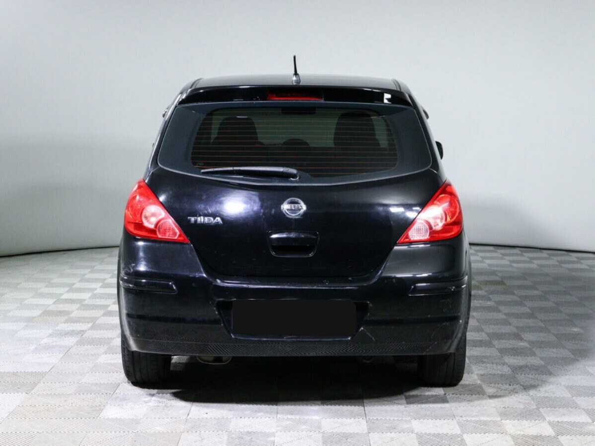 Nissan Tiida с пробегом — 2013 год. Фото: #4