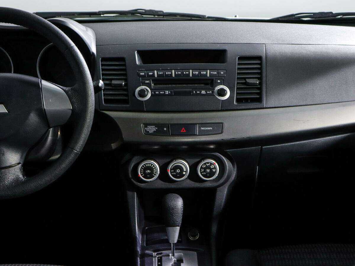 Mitsubishi Lancer с пробегом — 2012 год. Фото: #12