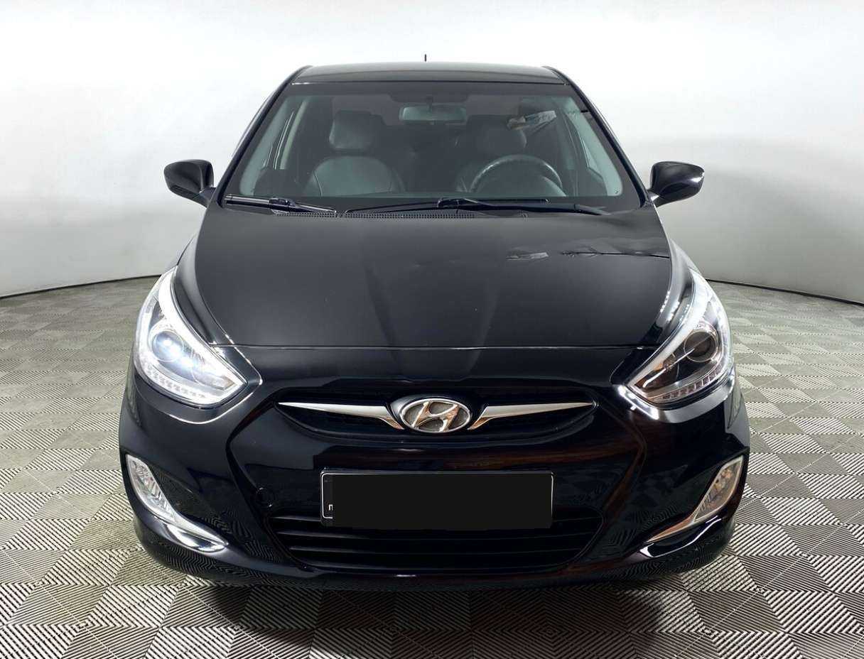 Hyundai Solaris с пробегом — 2013 год. Фото: #1