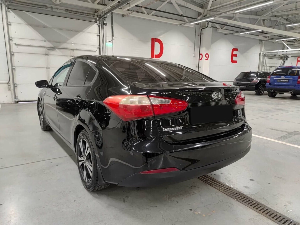 Kia Cerato с пробегом — 2013 год. Фото: #6