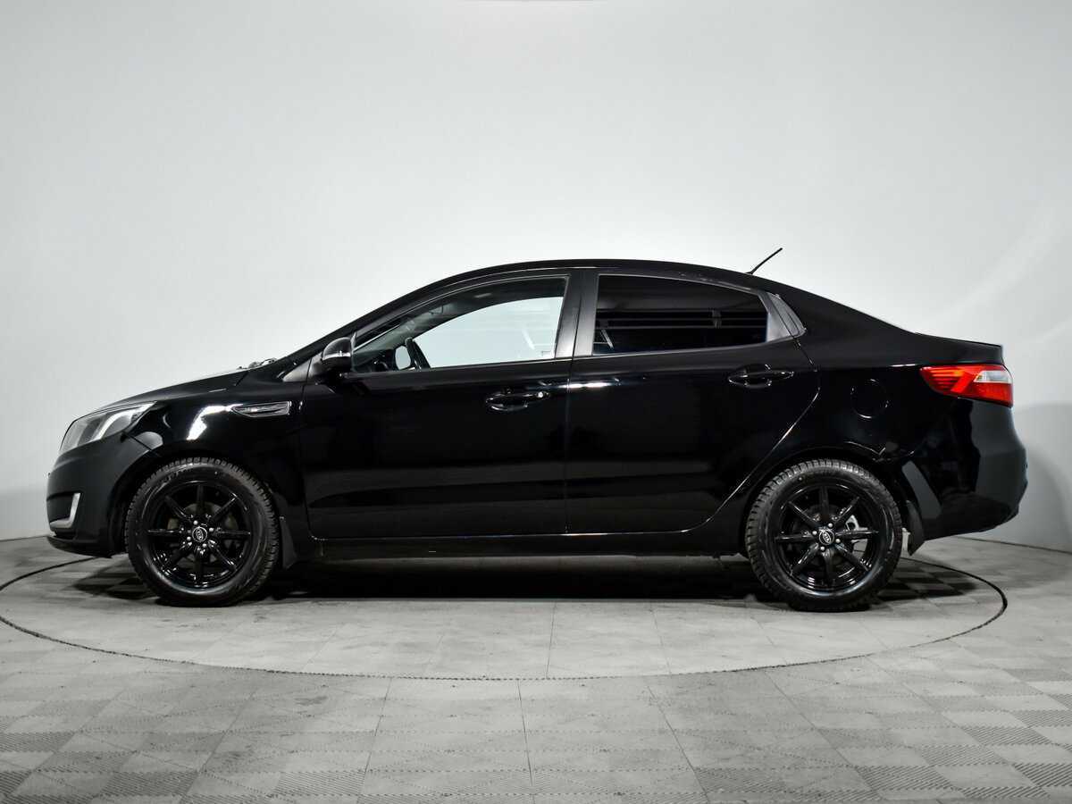 Kia Rio с пробегом — 2013 год. Фото: #7
