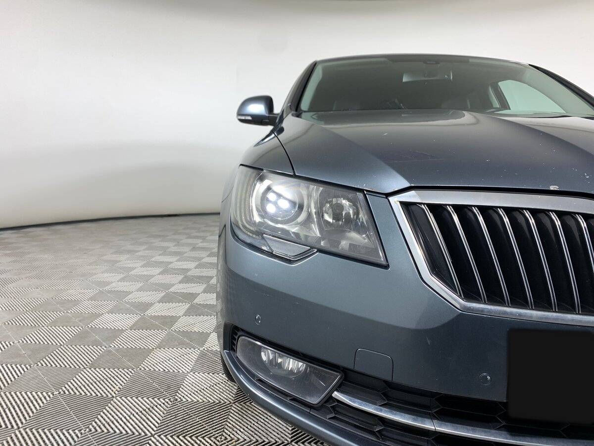 Skoda Superb с пробегом — 2014 год. Фото: #9