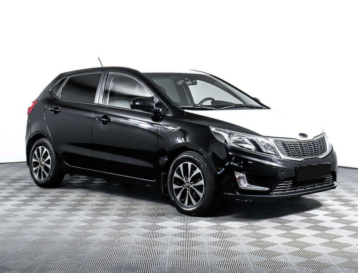 Kia Rio с пробегом — 2013 год. Фото: #2