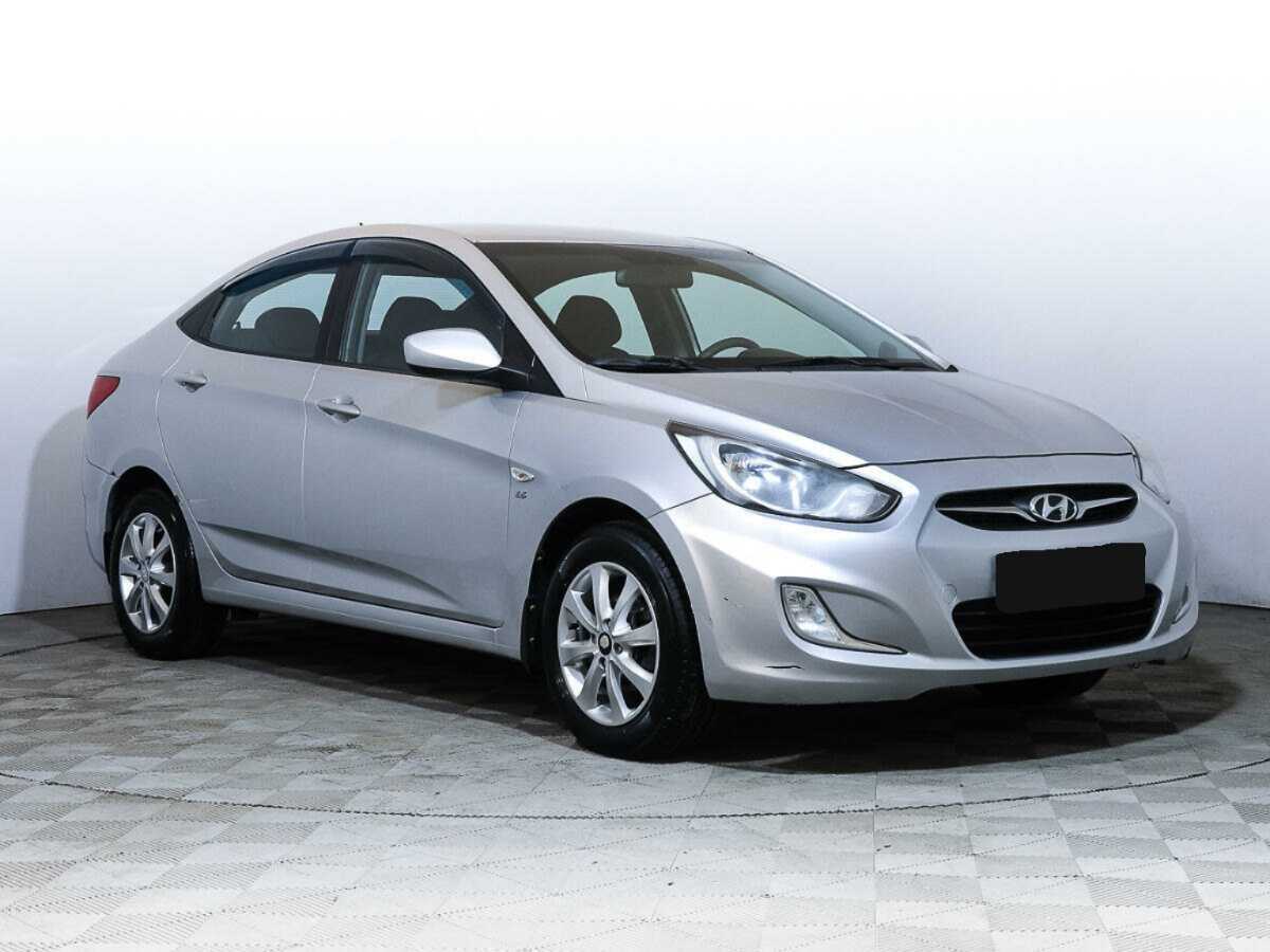 Hyundai Solaris с пробегом — 2012 год. Фото: #1