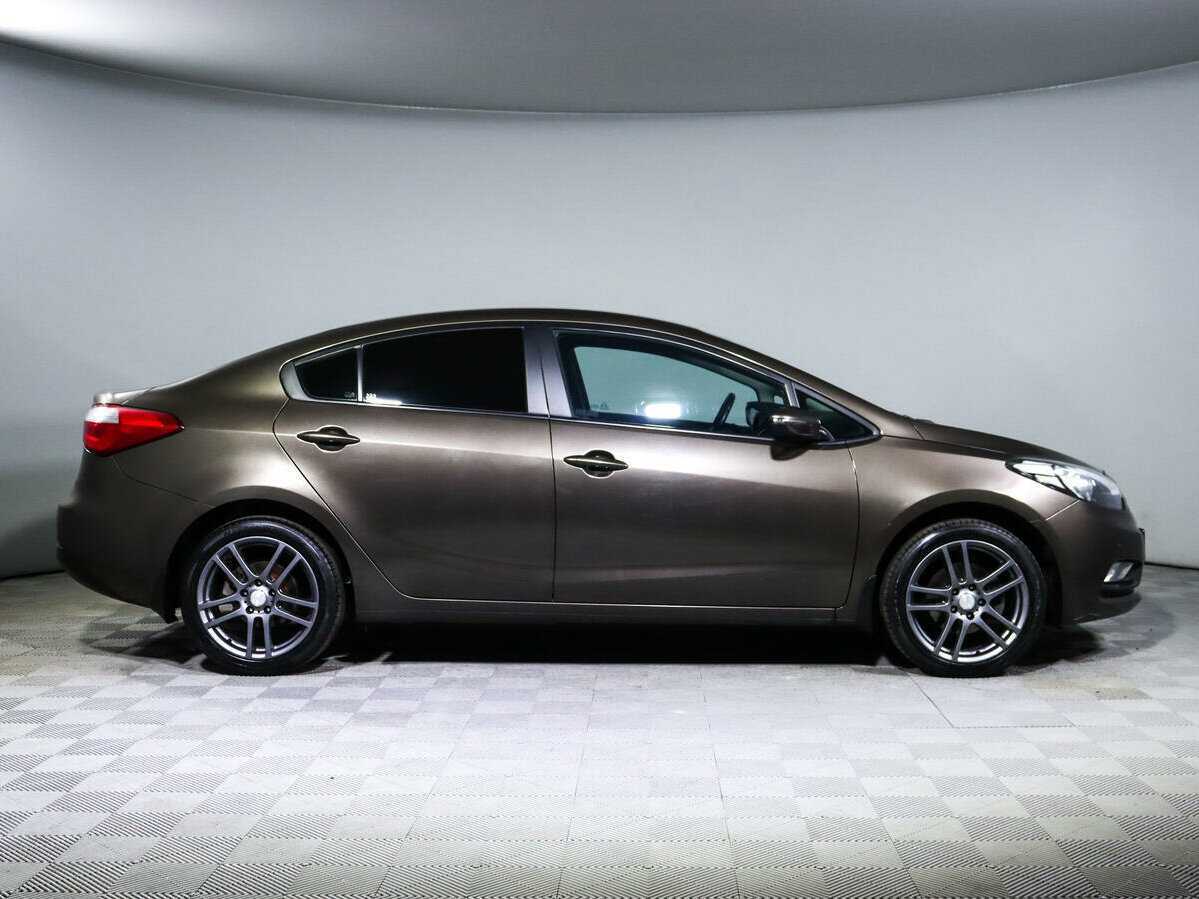 Kia Cerato с пробегом — 2015 год. Фото: #3