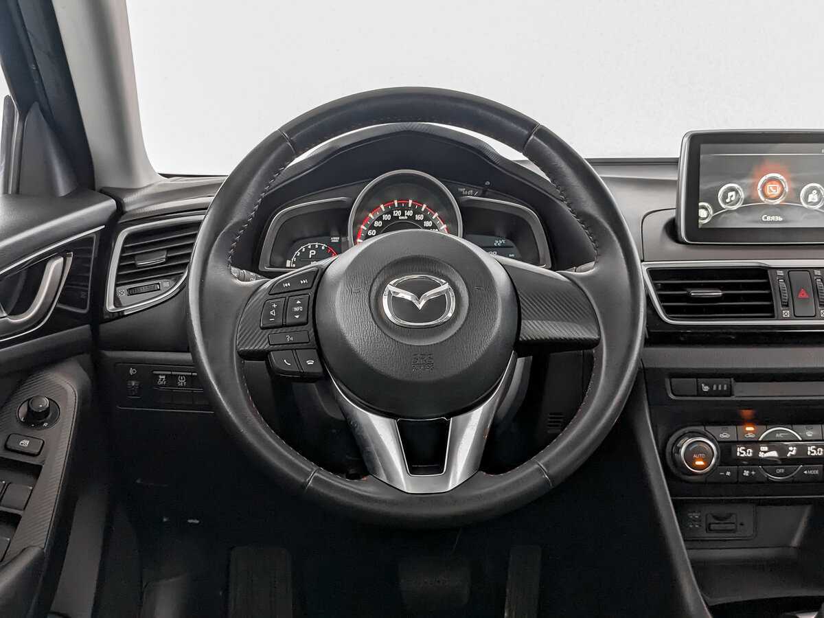 Mazda 3 с пробегом — 2015 год. Фото: #16