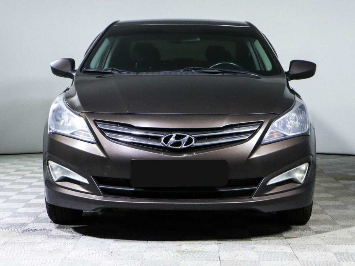 Hyundai Solaris с пробегом — 2014 год. Фото: #1