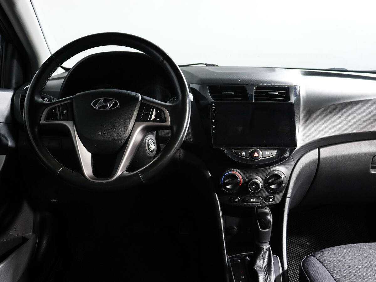 Hyundai Solaris с пробегом — 2014 год. Фото: #9