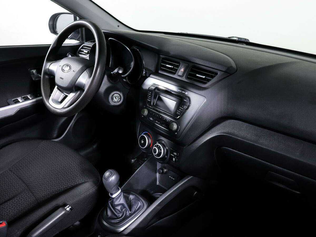 Kia Rio с пробегом — 2013 год. Фото: #7