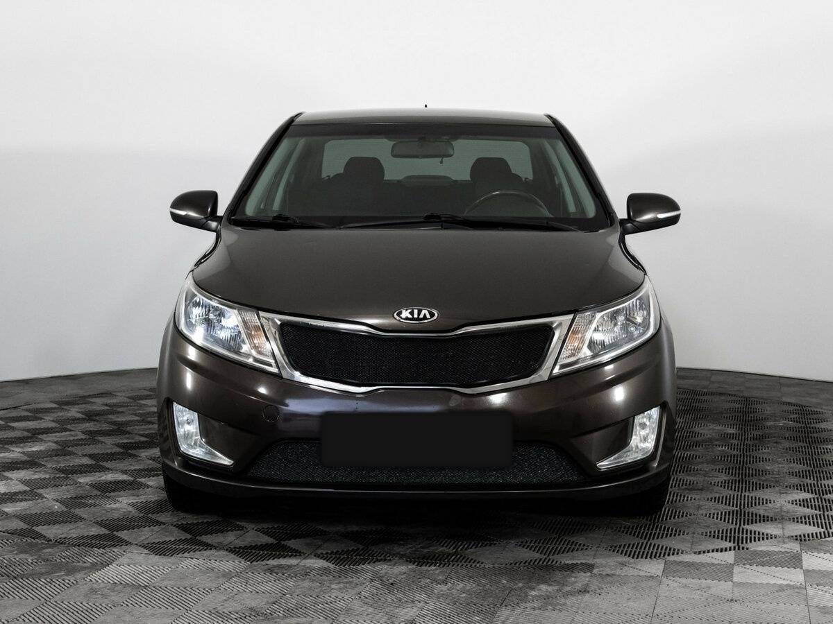 Kia Rio с пробегом — 2014 год. Фото: #1