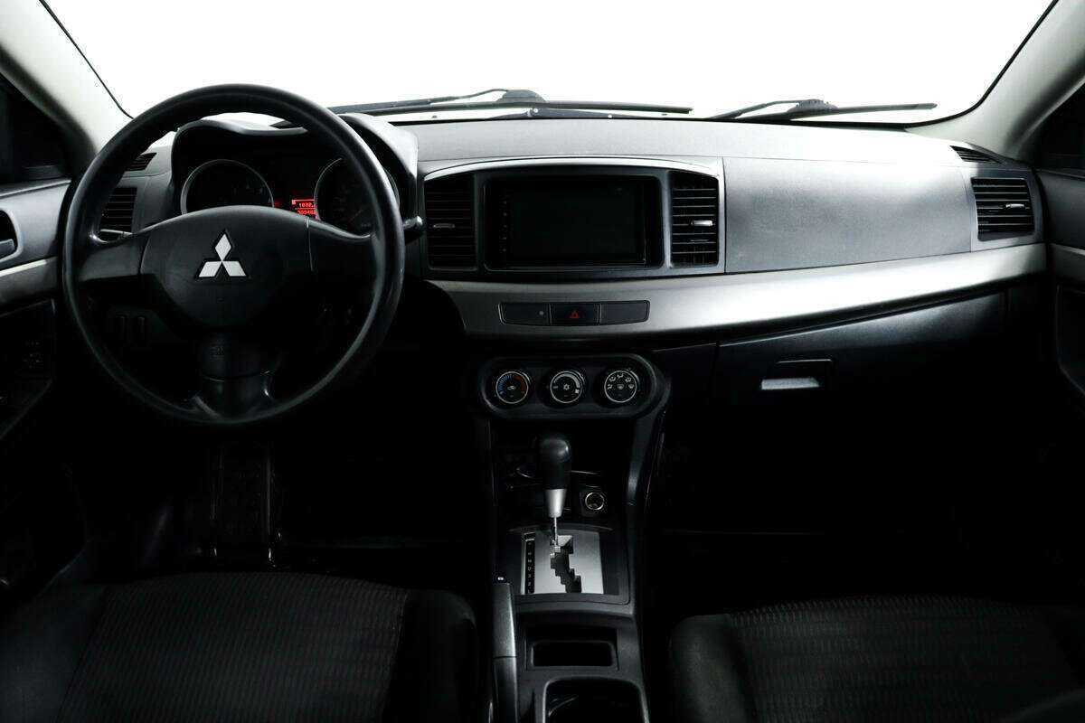 Mitsubishi Lancer с пробегом — 2012 год. Фото: #10