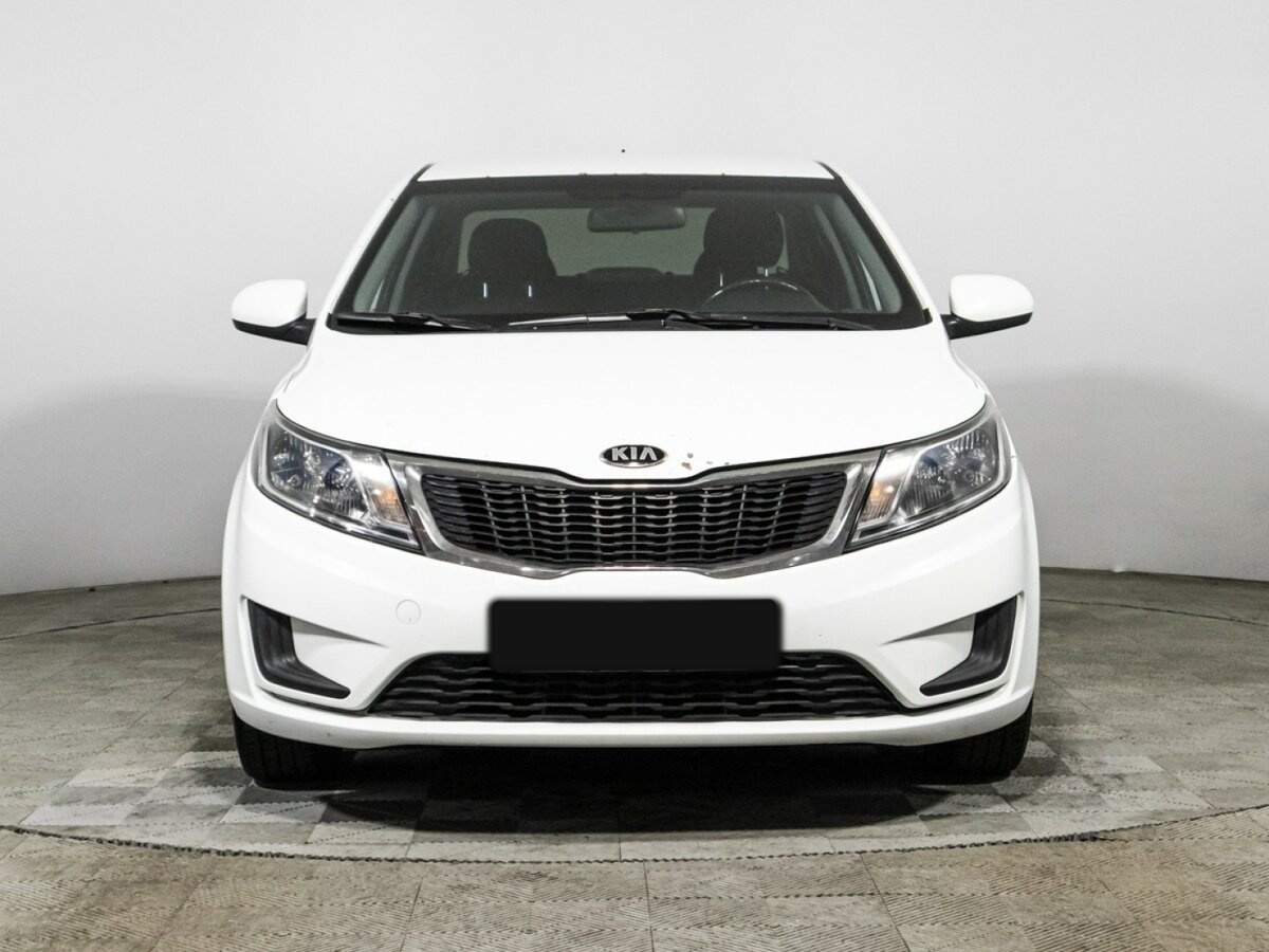 Kia Rio с пробегом — 2014 год. Фото: #1