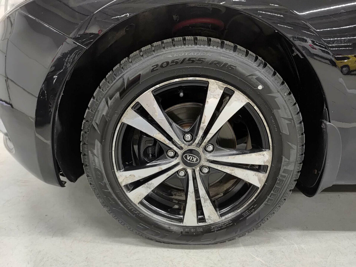 Kia Cerato с пробегом — 2013 год. Фото: #17