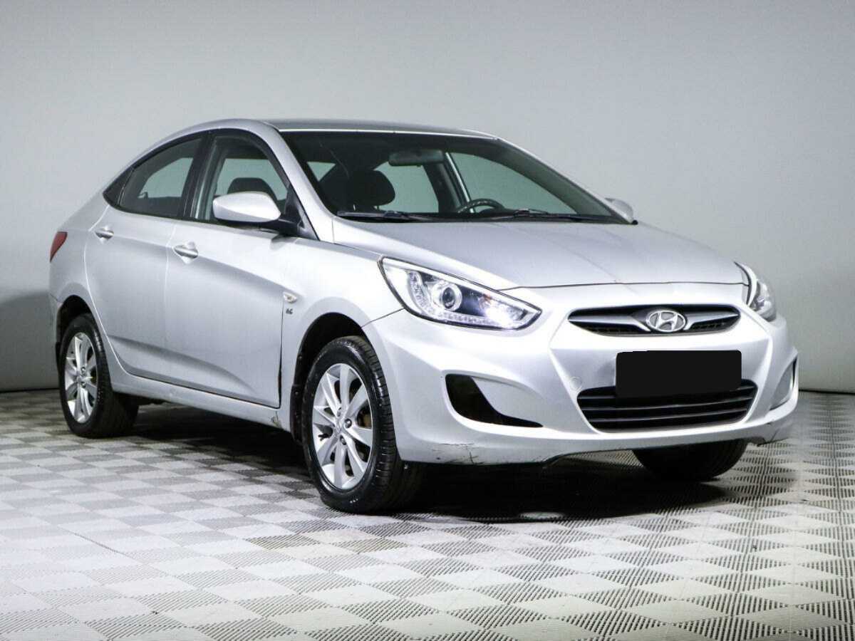 Hyundai Solaris с пробегом — 2013 год. Фото: #2