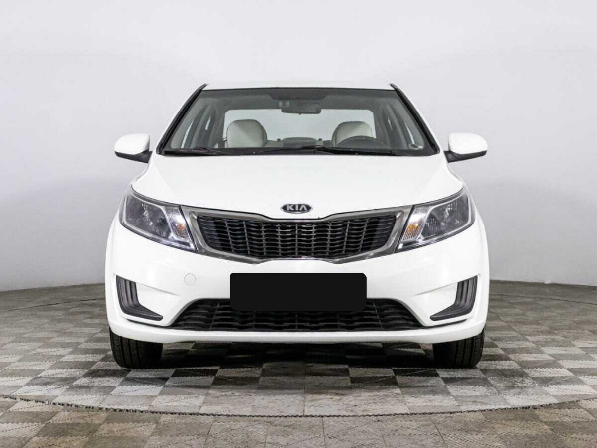 Kia Rio с пробегом — 2012 год. Фото: #1