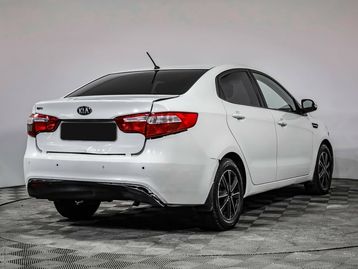 Kia Rio с пробегом — 2013 год. Фото: #3