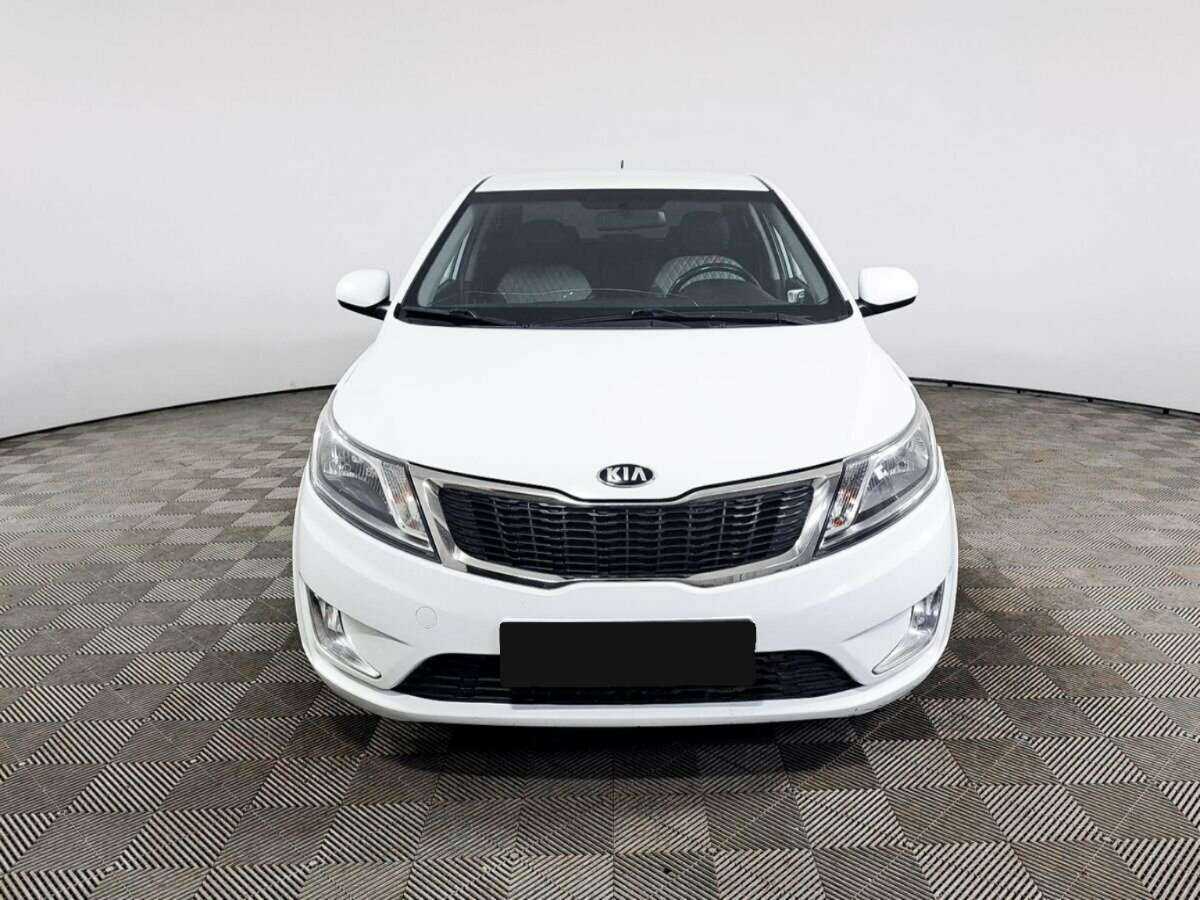 Kia Rio с пробегом — 2014 год. Фото: #1
