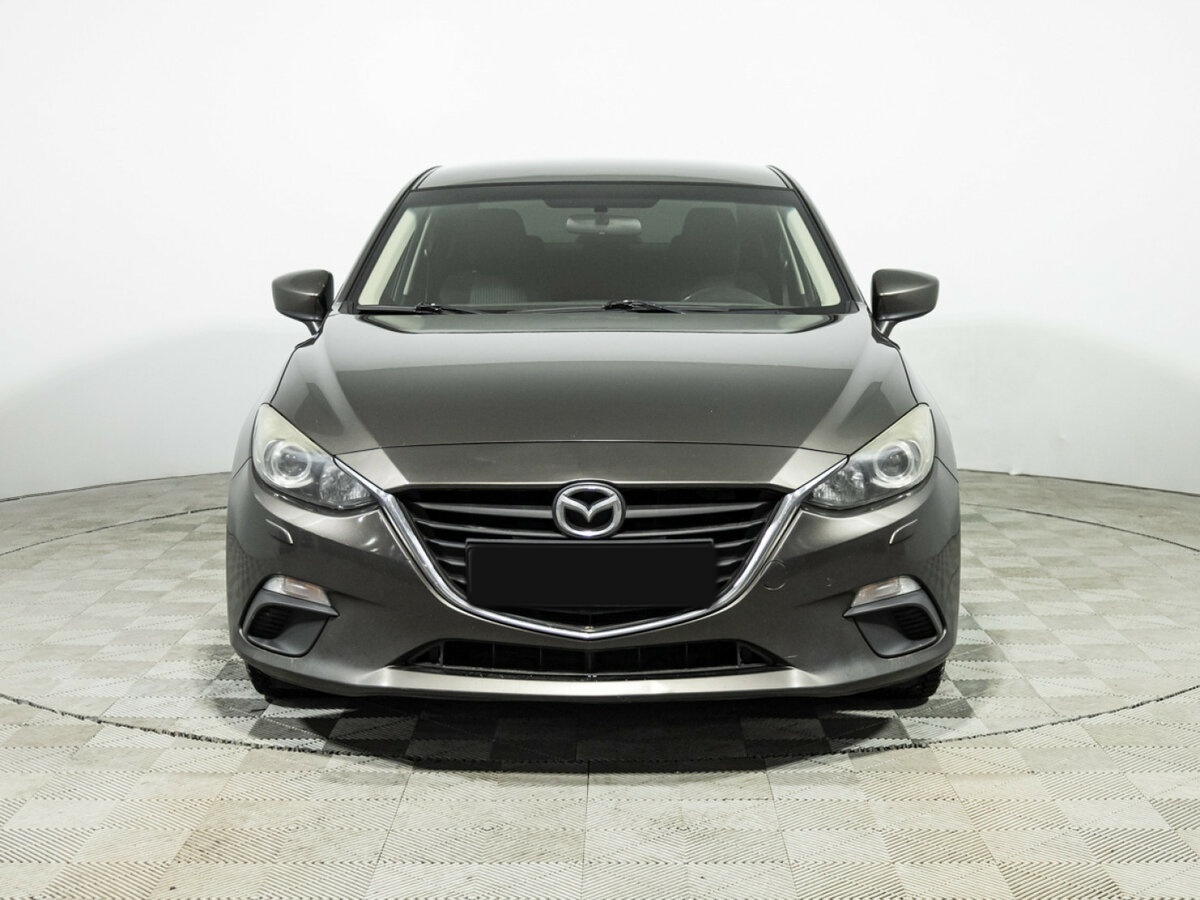 Mazda 3 с пробегом — 2014 год. Фото: #1